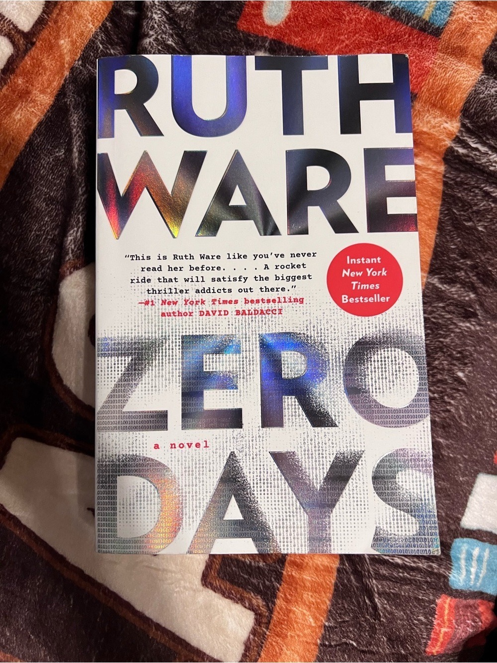 Ruth Ware "Zero Days" Paperback Novel - White with Iridescent Text